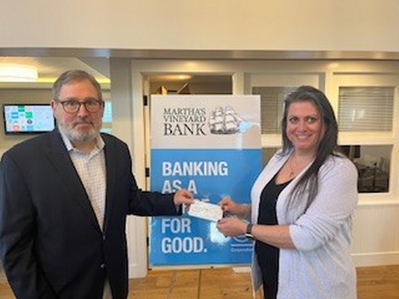 Jim Clabby and Jennifer Ray of MV Bank with the check donation to the Martha’s Vineyard Bank Charitable Foundation in January 2025.